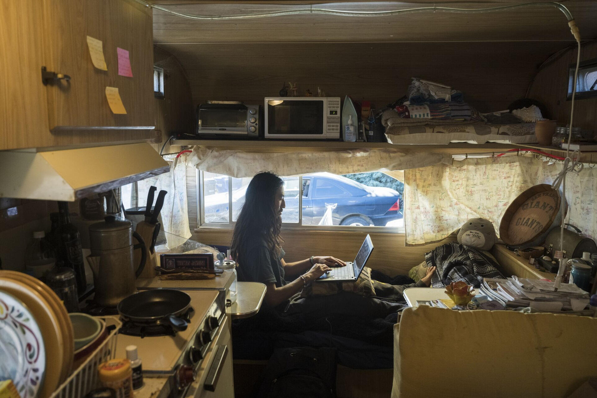 Image credit: Los Angeles Times. UCSC student Michael Chin lives in a trailer to be close to campus.